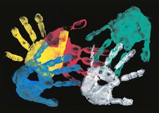 painted handprints on black background