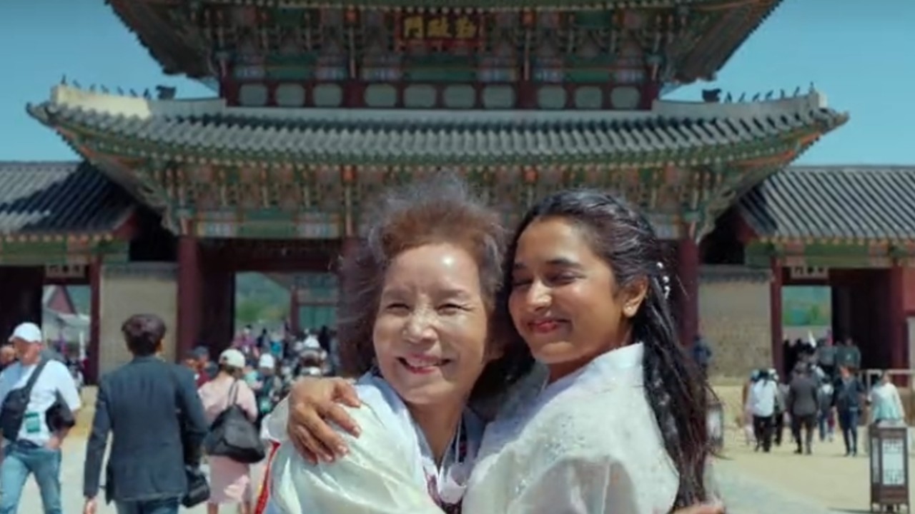 Park Hye-jin and Priyanka Mohan hugging in Made in Korea.