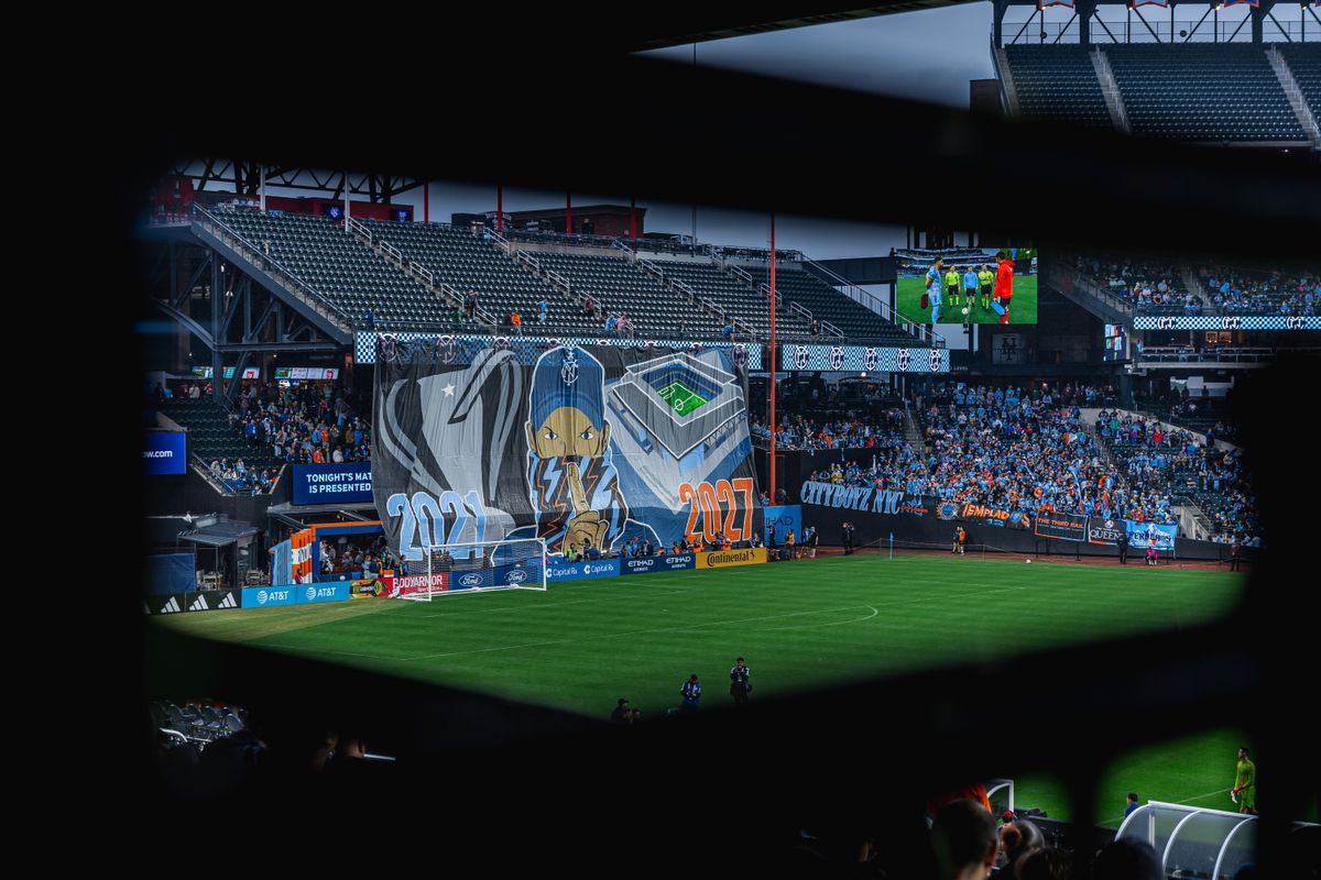New York City FC unveil a TIFO of a cartoon fan sssshing their rivals New York Red Bulls