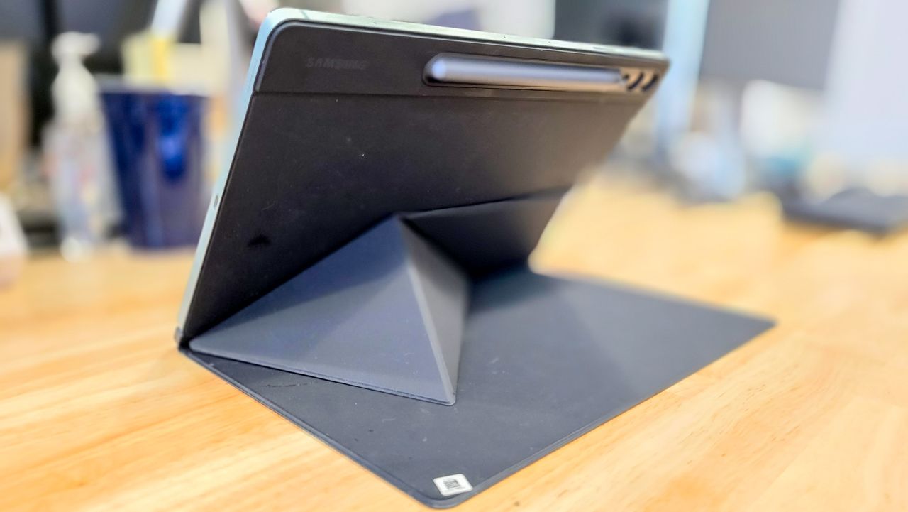 Samsung Galaxy Tab S9 FE Plus with screens and Book Cover in mint green