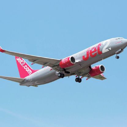 A Jet2 airplane in the sky.