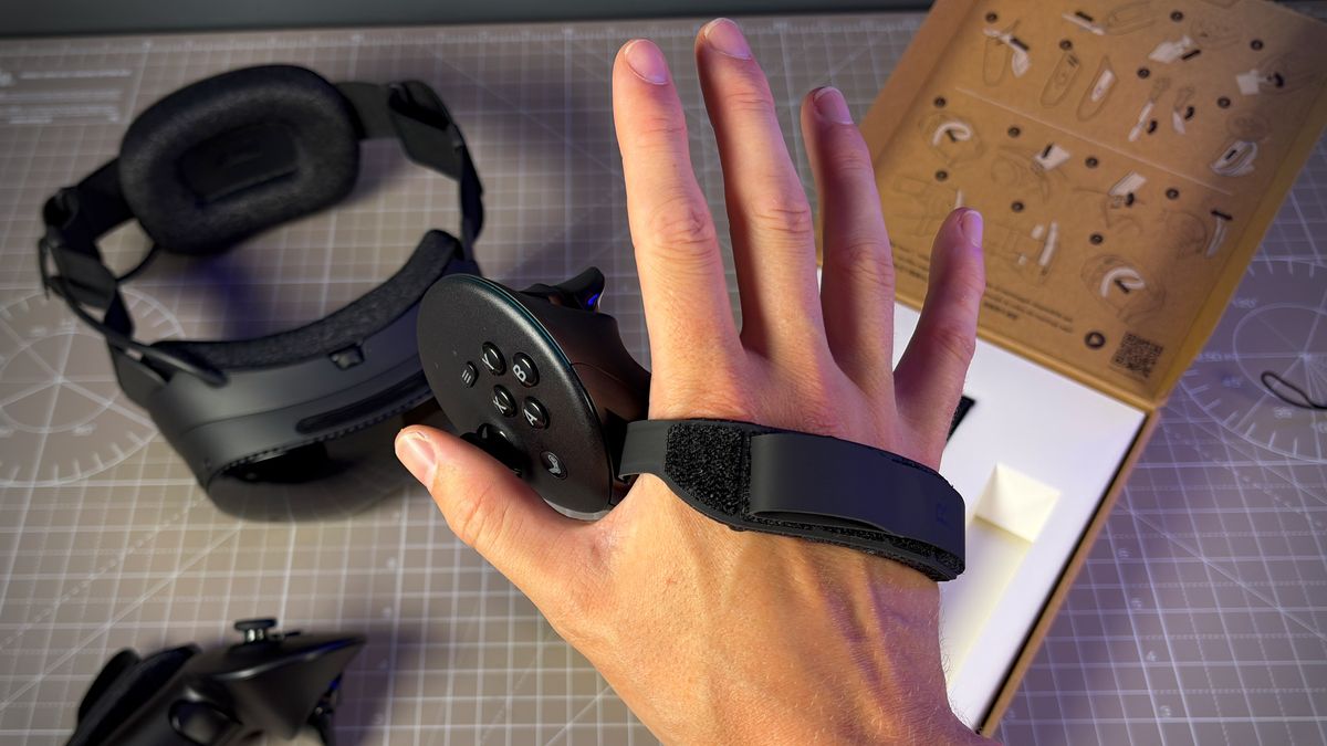 The Steam Frame controller with the ergonomic grip attached.