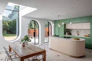 Kitchen with green units