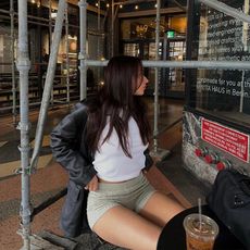 angelica wears hot shorts, t-shirt and leather jacket