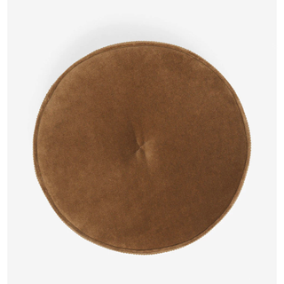 brown round velvet pillow