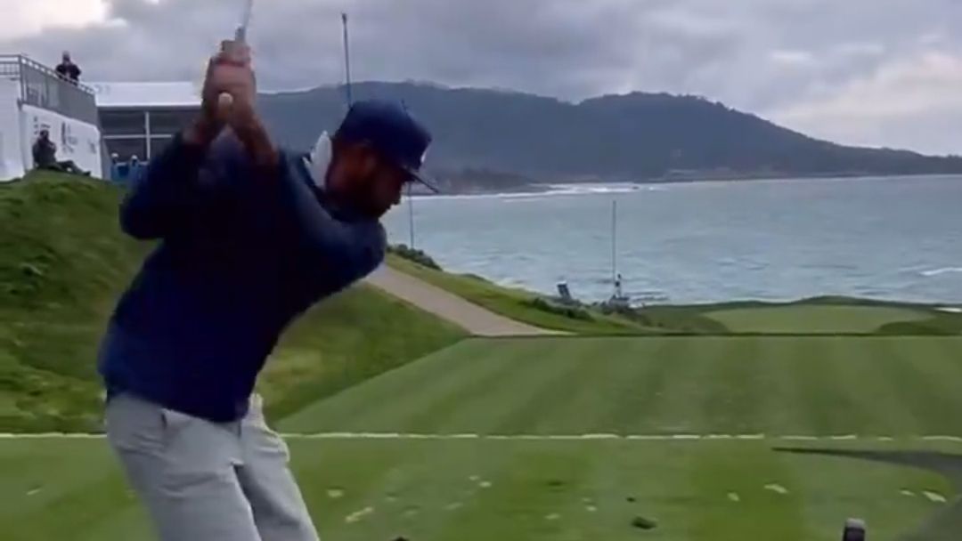 Tony Finau takes a shot at the seventh hole at Pebble Beach