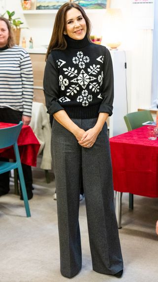 Queen Mary of Denmark attends the WeShelter Food Club Event at NABO Center Amager on December 17, 2024