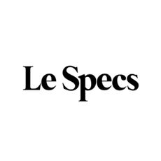 Two models wearing modern, round sunglasses from Le Specs. 