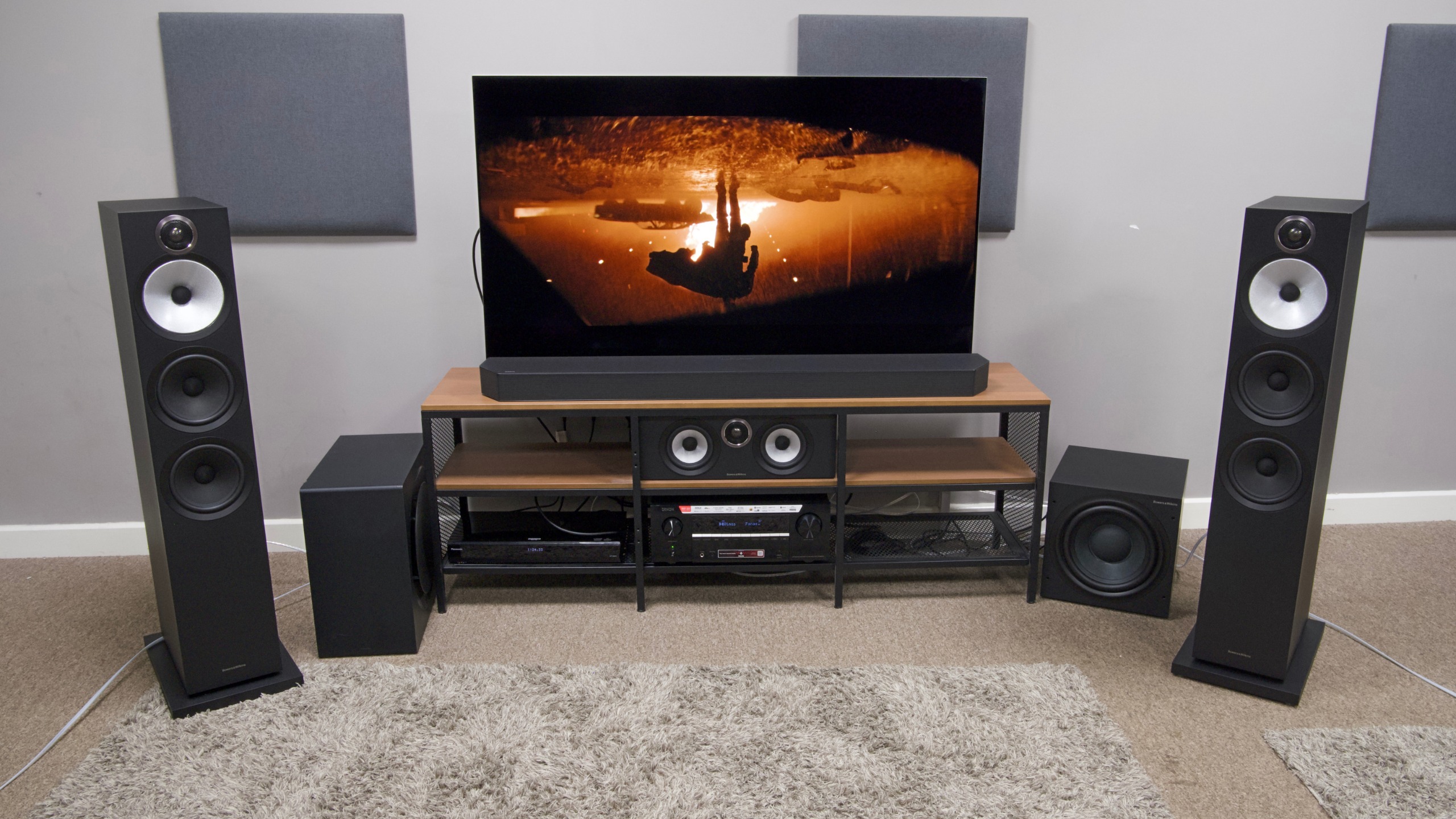 B&amp;amp;W 603 S3 speakers and Denon AVC-3900H and a Samsung HW-Q990C soundbar and subwoofer sat under an LG G6 on a TV stand
