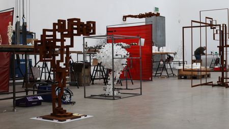 Inside the London studio of Antony Gormley featuring sculptures in progress