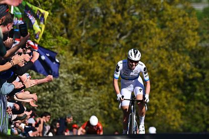 Demi Vollering racing uphill