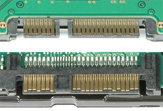 SATA vs. SAS (bottom): The SAS connectors are merged into one wide plug.