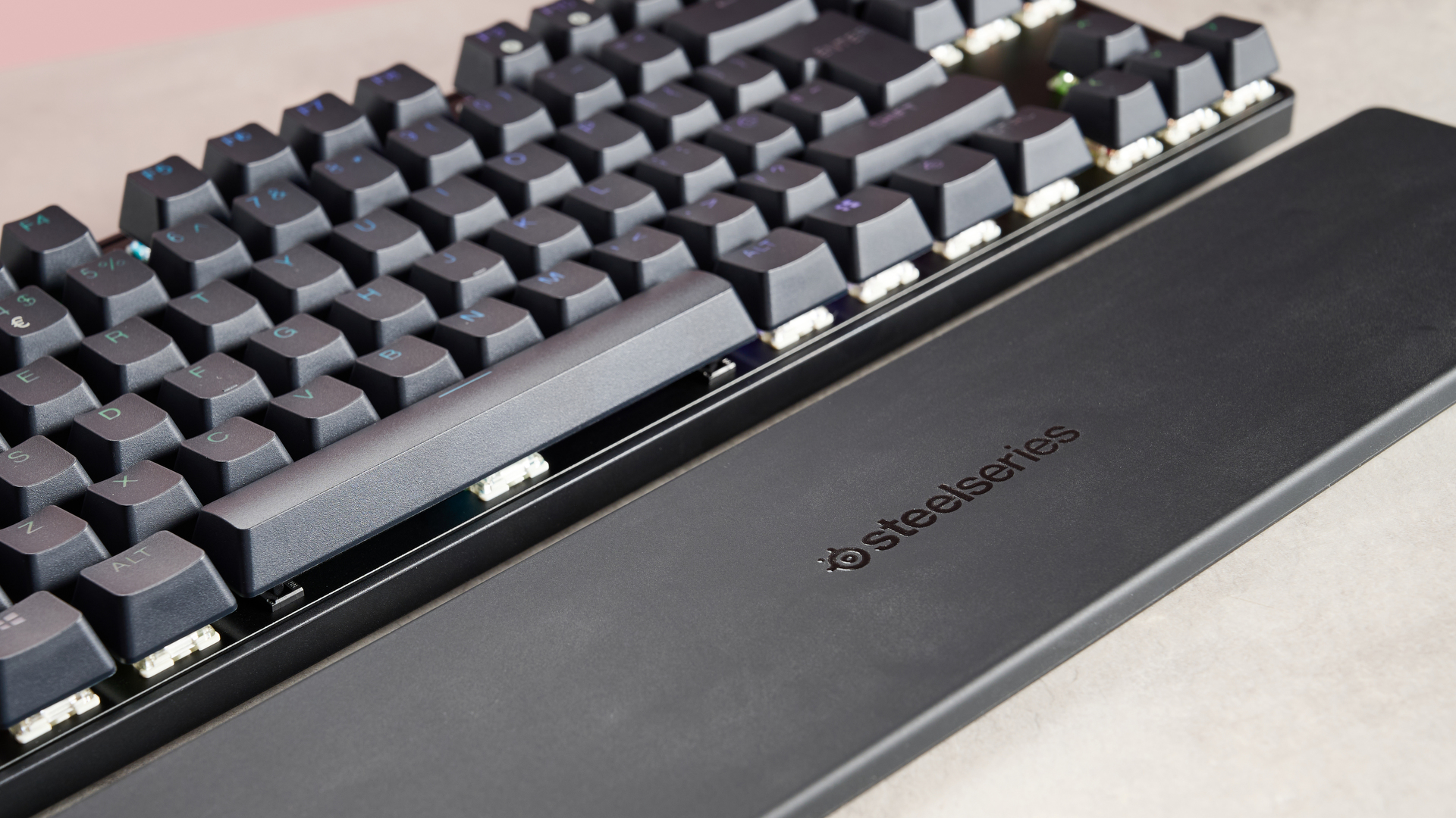 SteelSeries Apex Pro TKL Wireless Gen 3 with wrist rest on desk