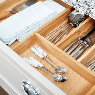 Inside of wood cutlery drawer