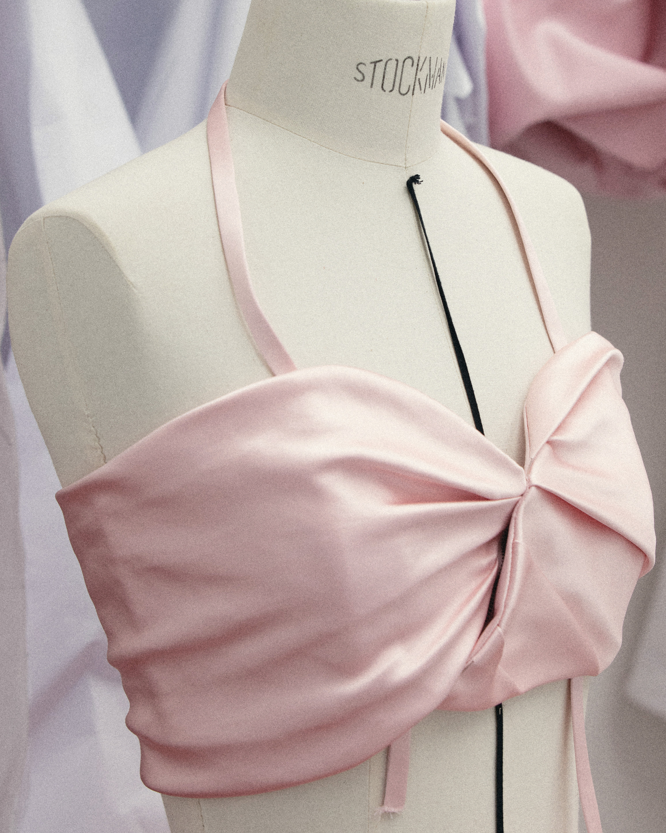 a close up of Jisoo's pink folded top
