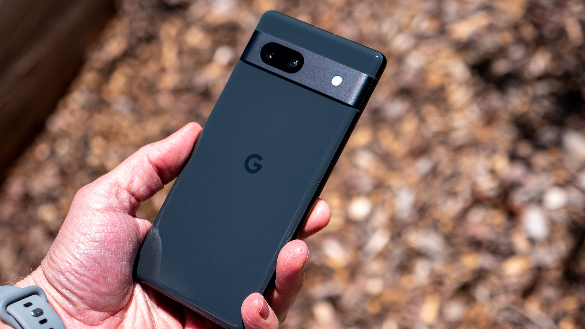 The back of the Charcoal Google Pixel 7a