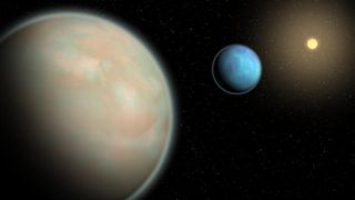 two planets, one blue (farther), one tannish/green (foreground) float in space. a yellow star hangs in the black distance.