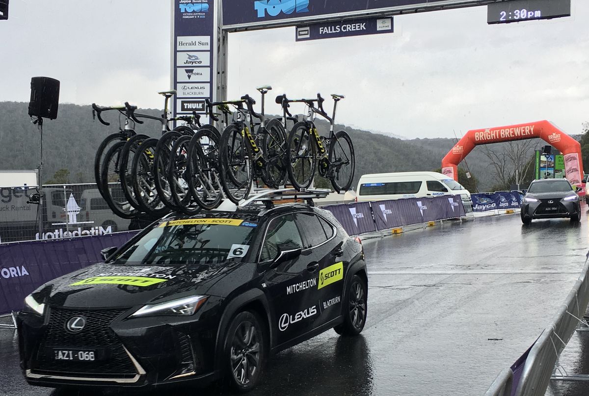 Defending champion Lucy Kennedy’s Mitchelton-Scott team car heads down the descent of Falls Creek to the new start at the bottom of the climb