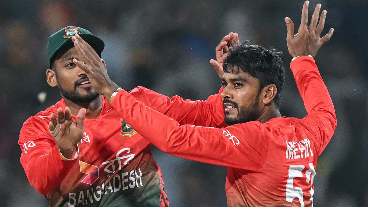 Bangladesh&#039;s Mehidy Hasan Miraz celebrates with his captain Najmul Hossain Shanto (L) after taking the wicket of India&#039;s Sanju Samson ahead of the India vs Bangladesh 2nd T20 2024 live stream