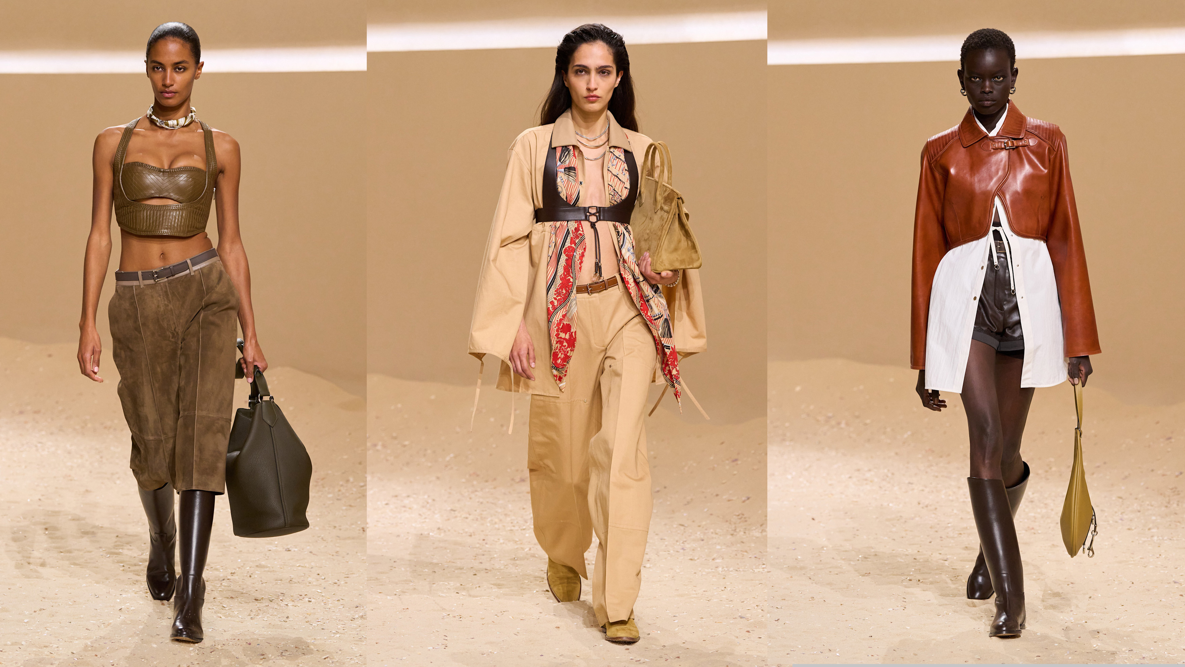 Three models walk the hermes spring 2026 runway show in paris.