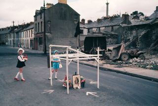 Two children playing in the road-Northern Ireland