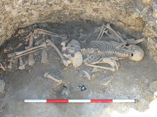 Archaeologists found the remains of an adult female who lived during the Iron Age in England.