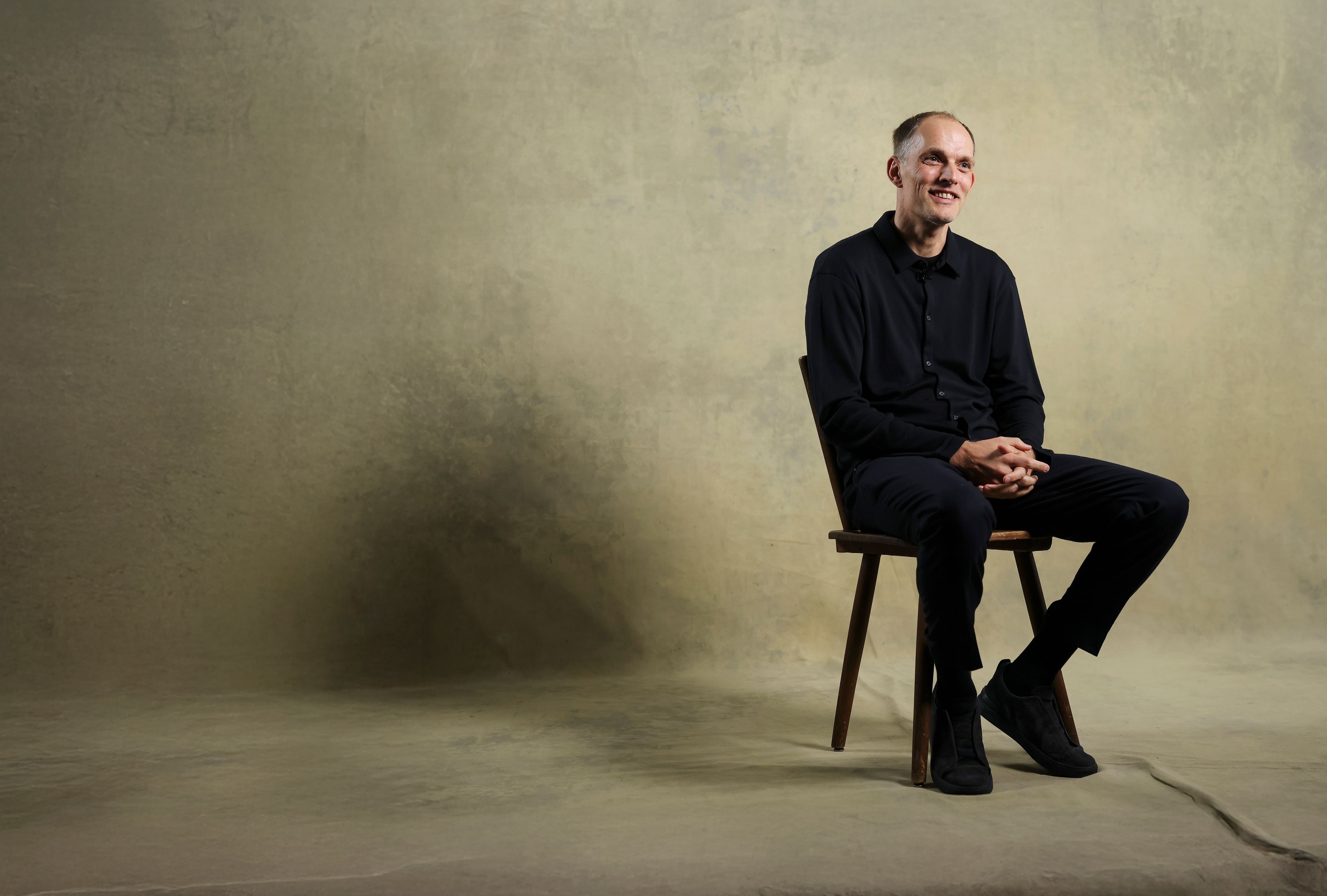 Thomas Tuchel sat on a chair during an interview.