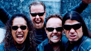 Metallica posing for a photograph in 2013