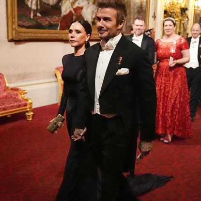 British fashion designer Victoria Beckham and Britain's former football player David Beckham arrive for a State Banquet at Buckingham Palace in London on December 3, 2024, on the first day of the Emir of Qatar's two-day State Visit to Britain. The Emir of Qatar and his wife are in the UK for a two-day State Visit, hosted by Britain's King