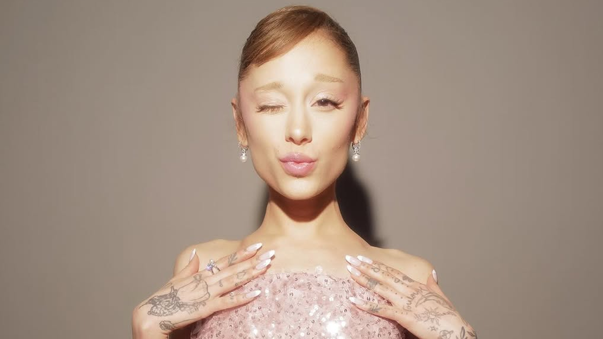 Ariana Grande wore a custom Balenciaga gown made of pink sequins on the Wicked: For Good press tour