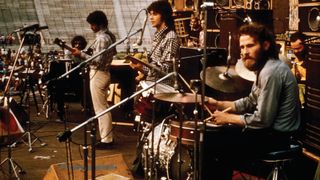 Performing with the Band in 1974. (from left) Richard Manuel, Rick Danko, Robertson, Levon Helm and Garth Hudson.