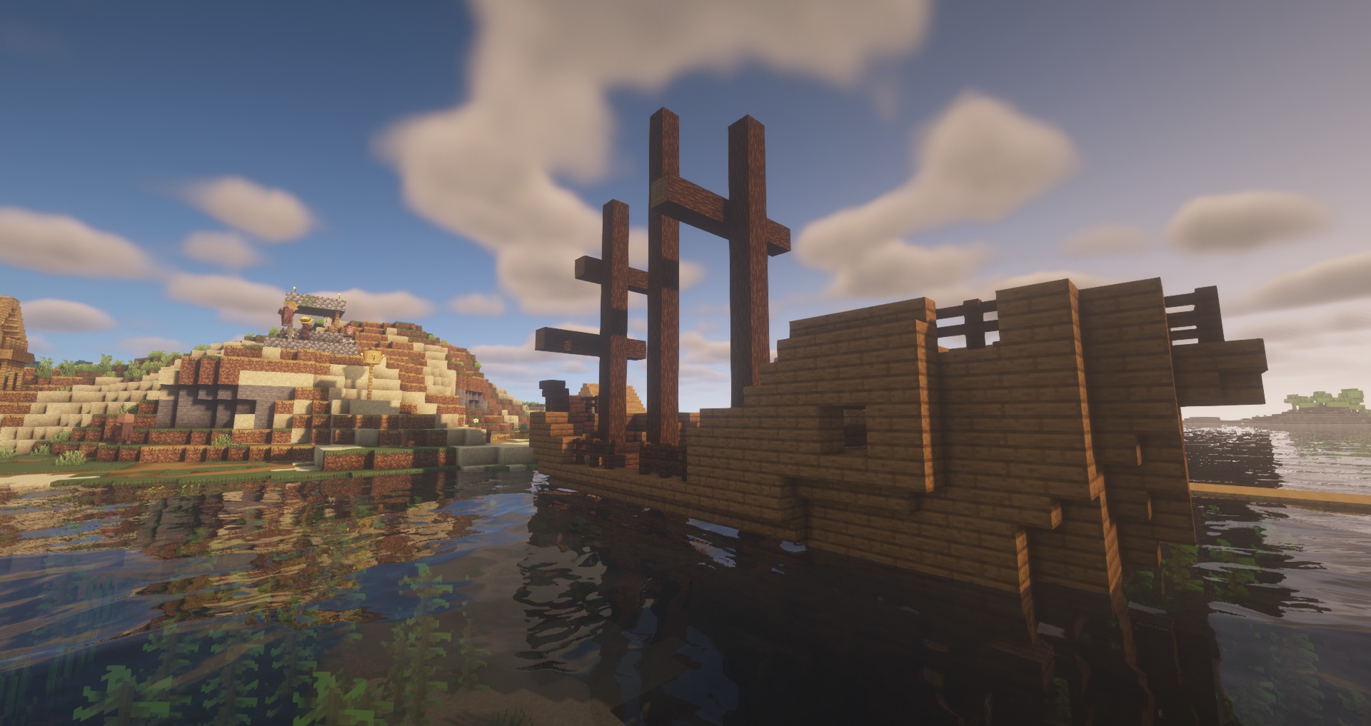 Minecraft seed - The Township - A "shipwreck" that's actually upright and appears to be docked in a Minecraft village.