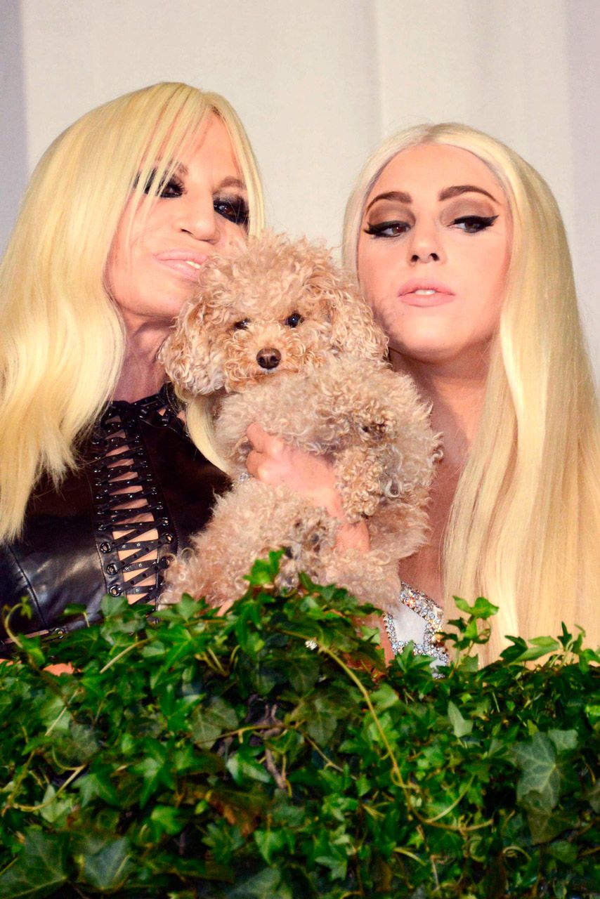 Donatella Versace and Lady Gaga on a balcony in Milan