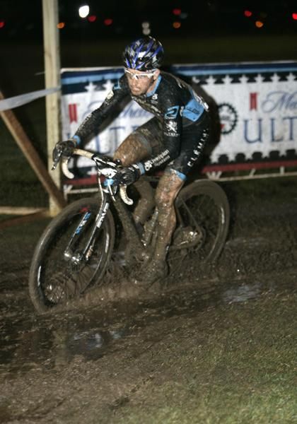 Allen Krughoff (Raleigh-Clement) cuts through the swamp.