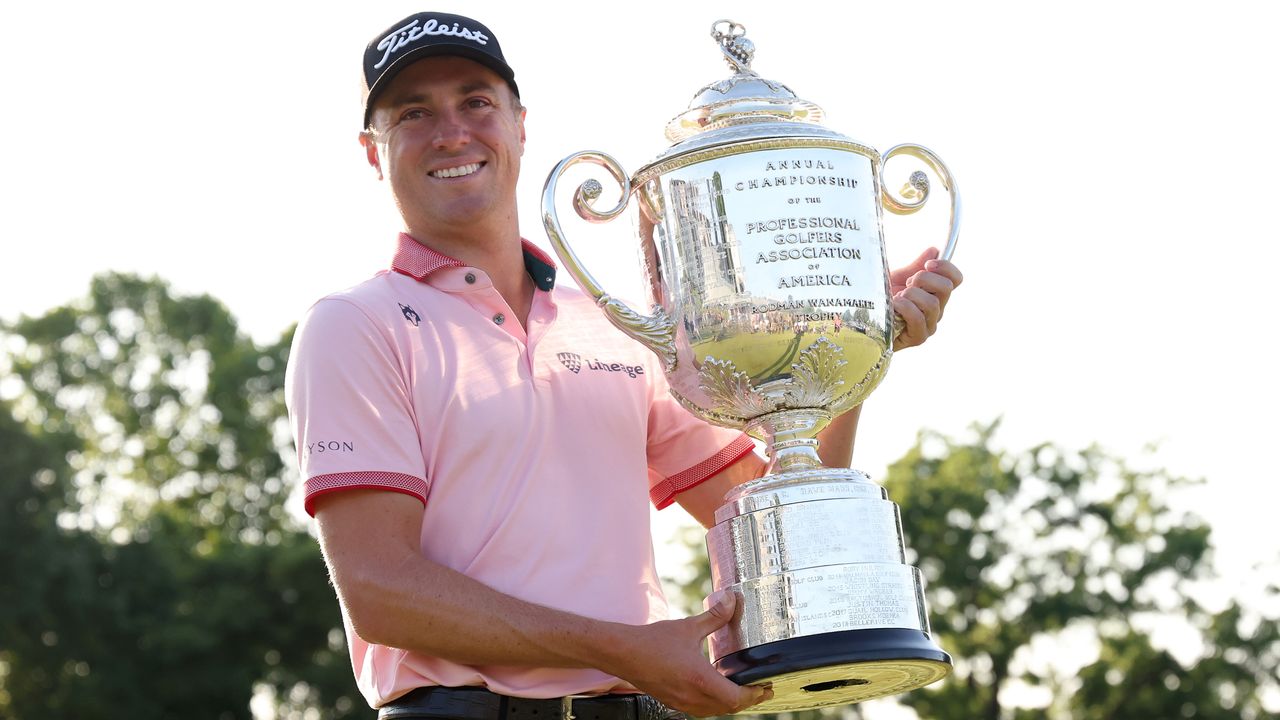 Justin Thomas holds Wanamaker Trophy