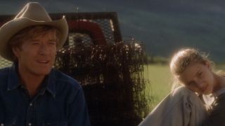 Robert Redford and Scarlett Johansson sitting on the back of a truck in The Horse Whisperer