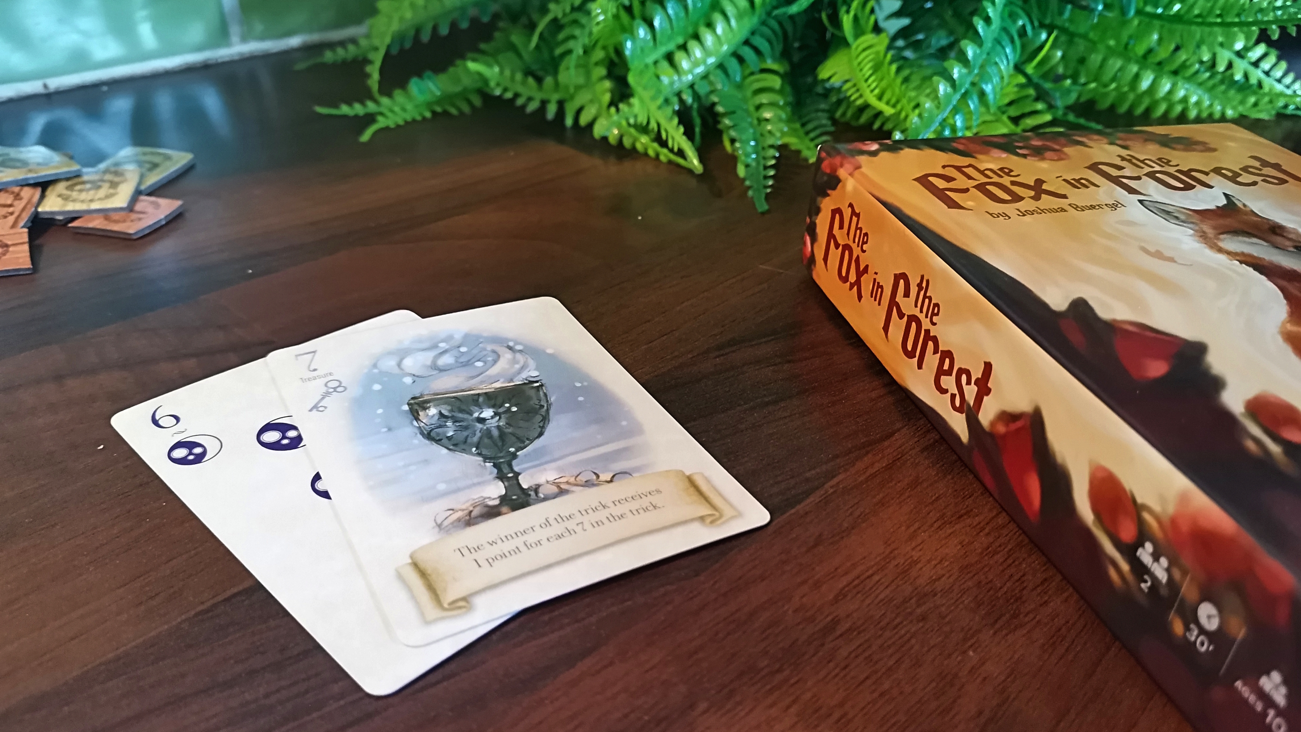 Fox in the Forest cards and box on a wooden table