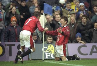 Teddy Sheringham (right) is congratulated by David Beckham after scoring for Manchester United against Chelsea in the FA Cup in January 1998.