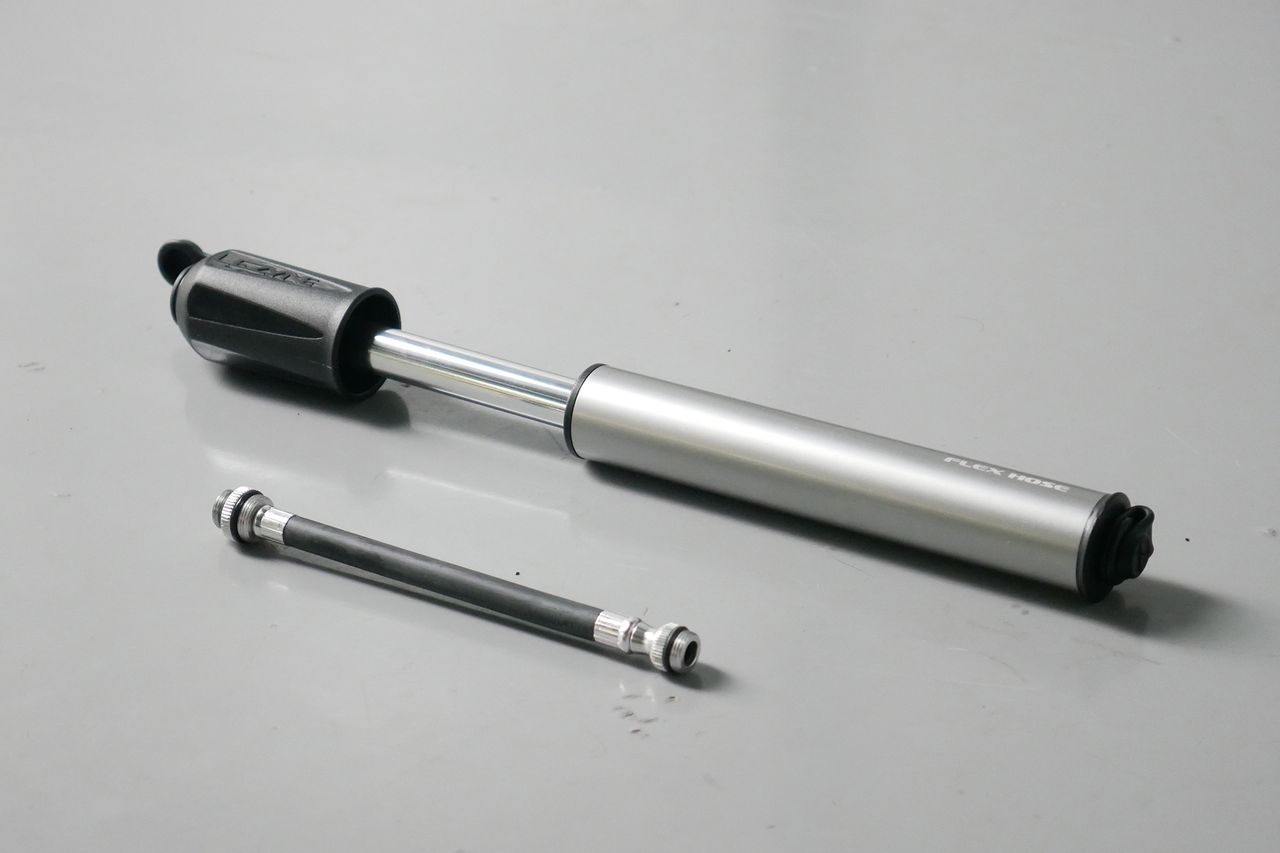 Best bike mini pumps group test 2026 - Lezyne Sport Drive sat next to its flexible hose