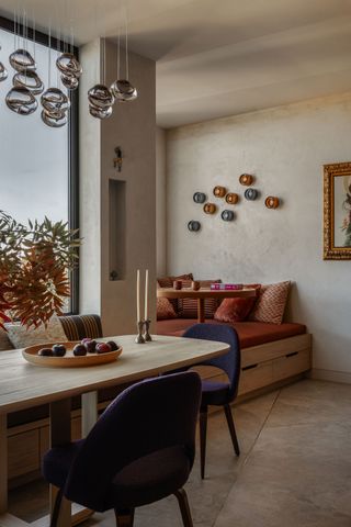 a limewash kitchen diner with a deep window seat