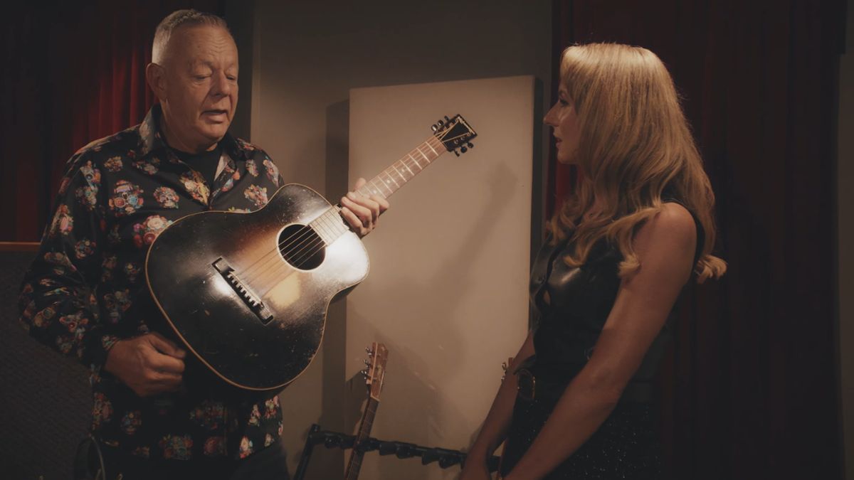 Tommy Emmanuel with his 1930s Gibson Kalamazoo acoustic guitar