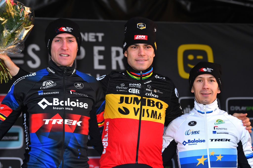 BOOM BELGIUM DECEMBER 04 LR Toon Aerts of Belgium and Team Baloise Trek Lions on second place race winner Wout Van Aert of Belgium and Team Jumbo Visma and Lars Van Der Haar of The Netherlands and Team Baloise Trek Lions on third place pose on the podium ceremony after the 7th Superprestige Cyclocross Boom 2021 Mens Elite SPBoom Superprestige2022 on December 04 2021 in Boom Belgium Photo by Luc ClaessenGetty Images