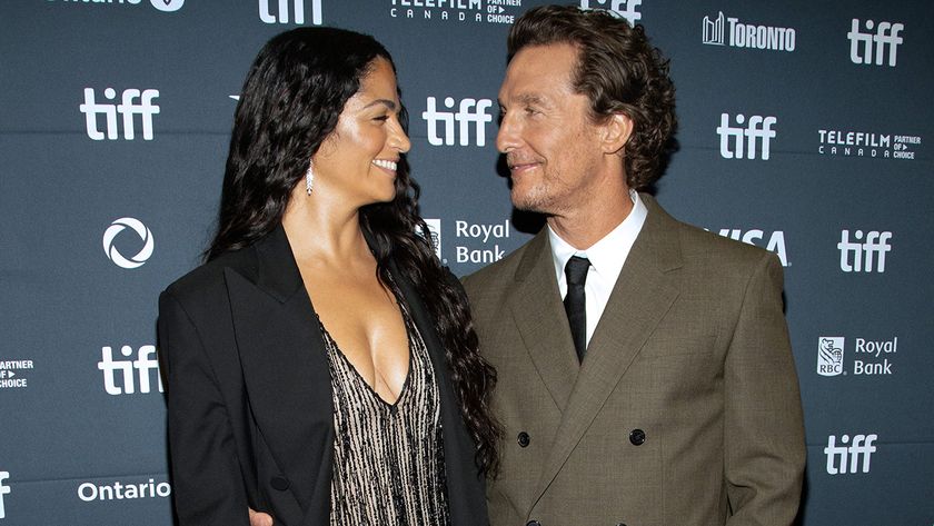 Matthew McConaughey and Camila Alves stare into each others&#039; eyes in blazers on the red carpet at Tiff. 