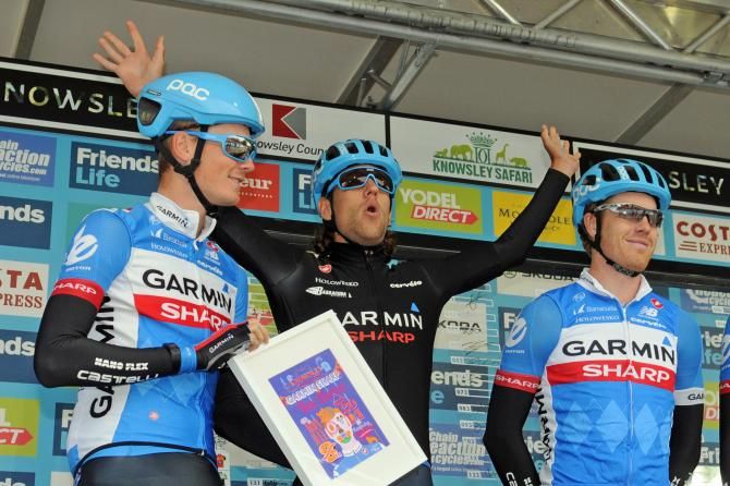 Thomas Dekker (Garmin Sharp) greets the crowd at sign in