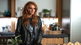 Kat (Bryce Dallas Howard) stands in a kitchen in a scene from Prime Video's "Deep Cover"