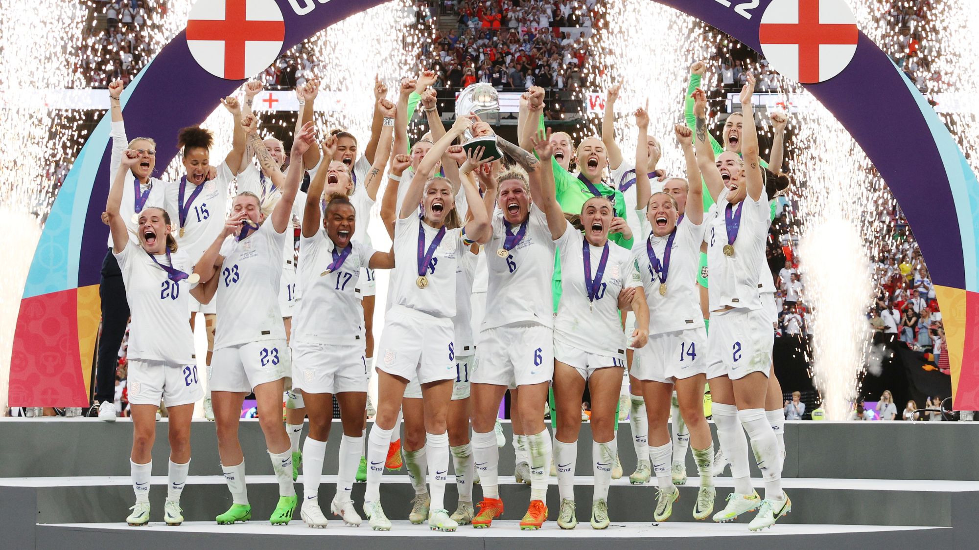 History of women's football: England players celebrate winning the UEFA Women's EURO 2022 Trophy after their sides victory during the UEFA Women's Euro 2022 final match between England and Germany at Wembley Stadium on July 31, 2022 in London, England.