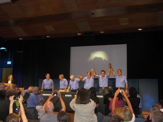 NASA officials and leaders of Curiosity's mission celebrate at a press conference after the rover landed successfully on Mars on Aug. 5, 2012.
