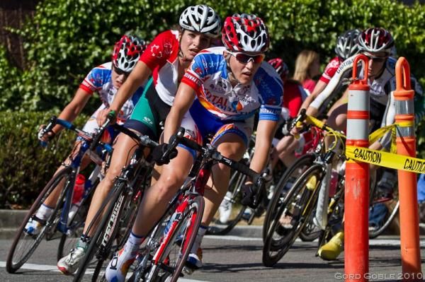 The pack rounds Corner 3 and sets up for a downhill run during Saturday's Women's Criterium.
