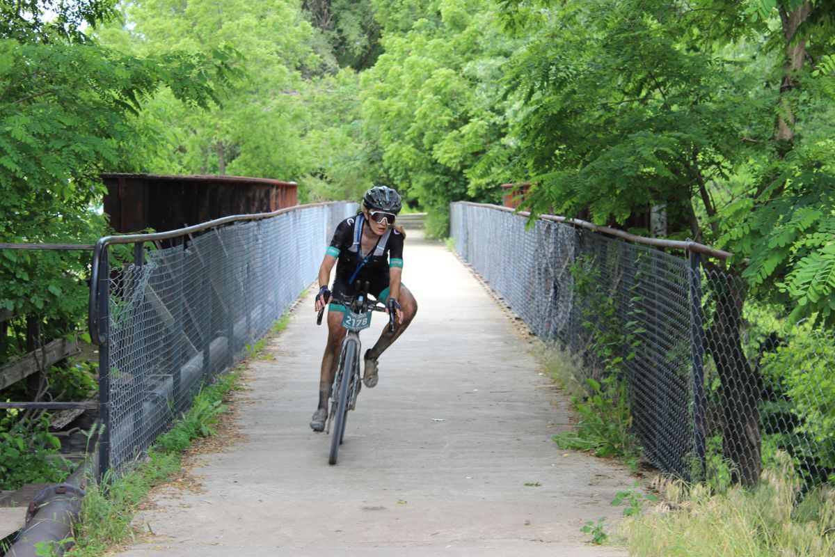 Lauren De Crescenzo at 2021 Unbound Gravel 200 on her way to victory with 55-mile solo break