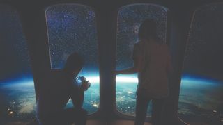 Two people looking through the windows of Spaceship Neptune and seeing the Earth below